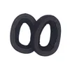 Two black ear pads for headphones are shown against a white background. Voir les images du produit