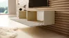 A modern living room with a wall-mounted TV cabinet. Anteprima dell’immagine prodotto