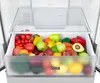 An open refrigerator drawer filled with various fruits and vegetables. Produktbild-Vorschau