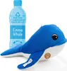 A blue plush whale toy is shown next to a plastic bottle with text indicating it is made from recycled materials. Produktbild-Vorschau