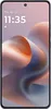 A smartphone displaying the lock screen with the time and date. Voir les images du produit
