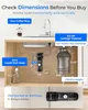 Diagram showing the dimensions of a water filter system under a kitchen sink, comparing its size to common household items like a coffee mug and dish soap, and a garbage disposal. Produktbild-Vorschau