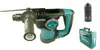 A rotary hammer drill and its accessories are displayed against a white background. Podgląd zdjęcia produktu