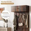 A wall-mounted coat rack with a cabinet above, displaying coats, a hat, and a bag on hooks. Náhled obrázku produktu