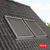 Two skylights with black blinds installed on a dark tiled roof. Voir les images du produit