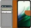 A flip case for a smartphone is shown open, revealing card slots and the phone screen. Produktbild-Vorschau