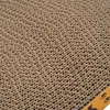 A close-up view of a corrugated cardboard scratching surface for cats. Produktbild-Vorschau