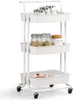 A white three-tier rolling cart filled with various kitchen items. Voir les images du produit