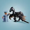 A Lego minifigure and a Lego dragon against a light blue background. Náhled obrázku produktu