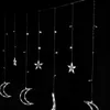 A string of decorative lights featuring crescent moons and stars against a black background. Náhľad obrázku produktu