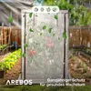A tomato greenhouse in a garden setting, with rain and leaves falling. Produktbild-Vorschau