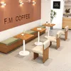 A modern cafe interior with tables and seating. Produktbild-Vorschau