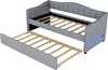 A grey upholstered daybed with an extended trundle bed. Náhled obrázku produktu