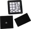 Three vacuum cleaner filters are laid out against a white background. The top filter is white with a black frame and a complex black design. The bottom left is a square black filter with a small white logo. The bottom right is a rectangular black filter. Produktbild-Vorschau