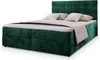 A green upholstered boxspring bed with a headboard and two pillows. Produktbild-Vorschau