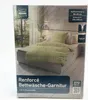 The image shows the packaging of a bedding set. Produktbild-Vorschau