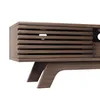 A close-up, studio shot of a wooden TV stand. Produktbild-Vorschau