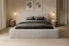 A bedroom scene featuring a bed. Produktbild-Vorschau