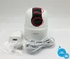 A white Imou Ranger IP camera is displayed with its accessories, including a power adapter and a USB cable, on a white background. Red circles highlight specific parts of the camera. Podgląd zdjęcia produktu