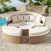 A circular outdoor lounge set with a canopy, situated next to a swimming pool and a stone wall. Voir les images du produit