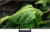 A close-up of a green leaf with water droplets on it, displayed on a TV screen. Produktbild-Vorschau