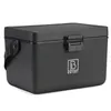 A black cooler box with a handle and a latch is shown against a white background. Produktbild-Vorschau