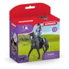 A toy horse and rider set in its retail packaging. Voir les images du produit