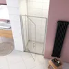 A modern bathroom with a shower enclosure, sink, and radiator. Produktbild-Vorschau