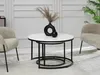 A modern living room setting with two nesting coffee tables, chairs, and decorative items. Náhľad obrázku produktu