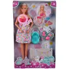 A doll in its packaging, showing accessories like a baby carrier, crib, and baby items. Anteprima dell’immagine prodotto