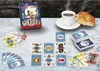 A card game is laid out on a marble table next to a cup of coffee and a croissant. Produktbild-Vorschau