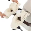 Hands are shown attaching fluffy white hand warmers to a stroller handle. Anteprima dell’immagine prodotto