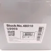 A close-up of a product box label with stock information, a QR code, and a diagram of the product. Produktbild-Vorschau