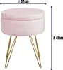 A pink upholstered ottoman with gold hairpin legs, with dimensions indicated by text overlays. Produktbild-Vorschau
