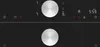 Close-up of a black induction hob control panel with silver dials and digital displays. Podgląd zdjęcia produktu