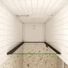 A top-down view of a shower enclosure with a white shower tray and tiled walls. Produktbild-Vorschau