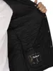 Close-up view of the inside of a black quilted jacket, showing the lining and a pocket with a brand label. Produktbild-Vorschau