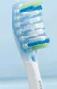 Close-up of the head of a Philips Sonicare electric toothbrush with blue, green, and white bristles. Anteprima dell’immagine prodotto