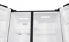 The interior of an open refrigerator with two compartments. Produktbild-Vorschau