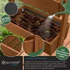 A wooden raised garden bed with young plants being watered. Produktbild-Vorschau