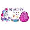 A collection of My Little Pony toys and accessories, including a pony figure on a skateboard, stickers, and a gem-shaped container. Náhled obrázku produktu