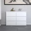A white dresser against a patterned wall. Produktbild-Vorschau