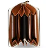 An open wallet with multiple compartments. Produktbild-Vorschau