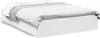 A white bed frame with drawers, viewed from the side. Náhled obrázku produktu