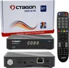A product shot of a digital satellite receiver and its remote control, along with its packaging. Produktbild-Vorschau