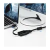 A laptop connected to an external monitor via a Ugreen adapter. Voir les images du produit
