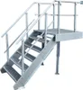 A metal staircase with a platform and railings, isolated on a white background. Produktbild-Vorschau