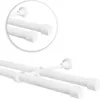 A close-up view of a white double curtain rod with end caps, mounted on a wall. Anteprima dell’immagine prodotto