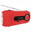 A red emergency radio with an antenna and a flashlight on a white background. Produktbild-Vorschau