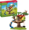 The image shows the packaging of a toy treehouse set, with the toy itself displayed in front of the box. Anteprima dell’immagine prodotto